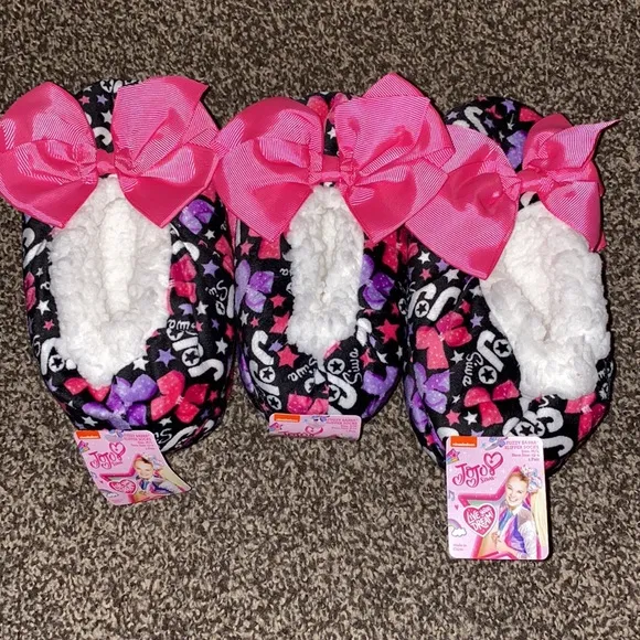 3 of the Jojo Siwa Fuzzy Babba Slipper Socks