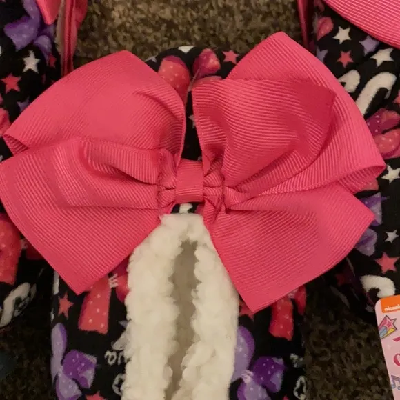 3 of the Jojo Siwa Fuzzy Babba Slipper Socks