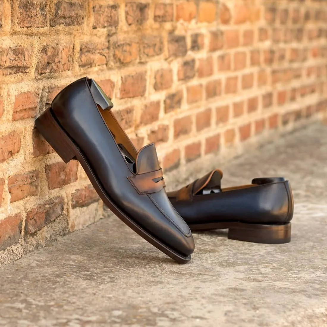 Mocassins Penny à bandeau en cuir patiné bleu marine et cognac